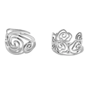 Elegant gold swirl stainless steel open ring with artistic wavy hollow design