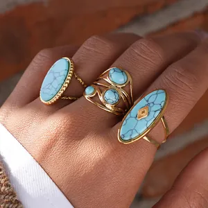 Bohemian gold stainless steel rings with turquoise stones in a stylish layered look