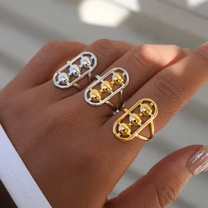 Anillos minimalistas antiestrés con tres cuentas deslizantes en acabado oro y plata