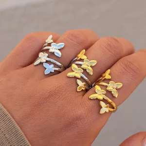 Set di tre anelli aperti a farfalla in acciaio inossidabile finiture color oro e argento