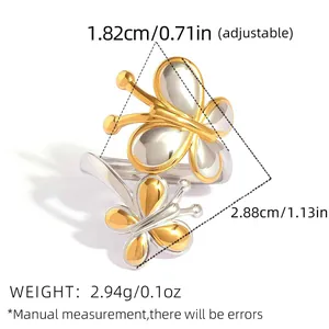 Detailed view of adjustable stainless steel ring with dual butterfly design and dimensions