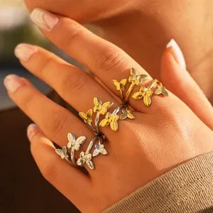 Anello aperto a farfalla minimalista regolabile in finiture oro e argento lucido