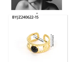Detail showing dimensions of a gold stainless steel ring with black natural stone inlay