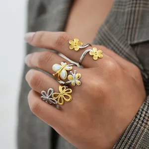 Floral and butterfly open rings in polished gold and silver finish for women