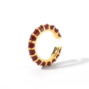18K gold plated C-shaped cuff earring with deep red enamel detailing on white background