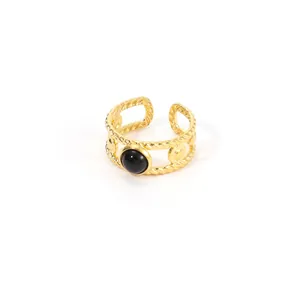 Adjustable golden stainless steel ring with black natural stone and woven rope design