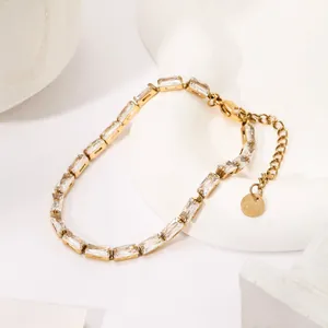 18k gold plated stainless steel bracelet featuring sparkling baguette cut crystals