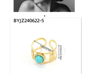 Macro detail of gold vintage ring with turquoise stone and sunburst engraving measurements