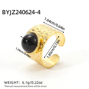 18K gold plated stainless steel adjustable ring with black natural stone and hammered texture