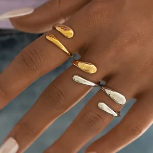 Polished stainless steel geometric teardrop open ring in gold and silver finish