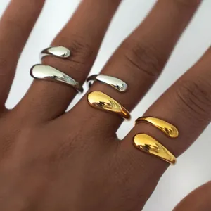 Elegant geometric waterdrop open ring in polished gold and silver stainless steel