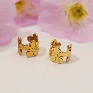 Golden flower non-pierced ear cuff in stainless steel with a polished five-petal floral design