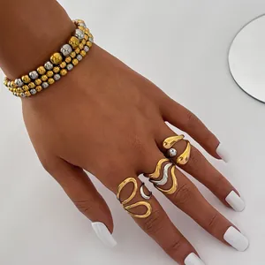 Minimalist geometric stainless steel jewelry set with stacked beaded bracelet and rings