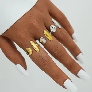 Minimalist geometric titanium steel rings with polished capsule charms in gold and silver