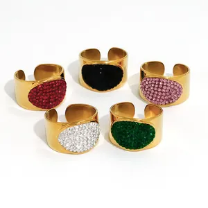 Gold plated cuff bangles set with oval rhinestone insets in five vibrant colors