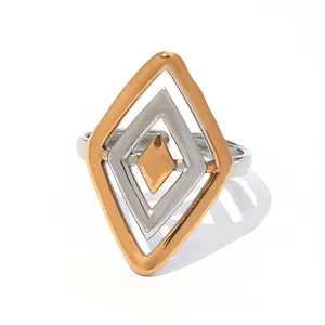 Bague ouverte géométrique irrégulière en losange avec finition métallique bicolore or et argent
