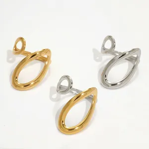Three minimalist organic curved open rings in polished gold, silver, and dual-tone finish