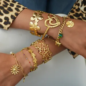 Elegant gold flower hollow cuff bracelet and luxury heart charm jewelry set for women