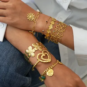Elegant gold hollow flower cuff and layered heart bracelet set for women wrist accessories