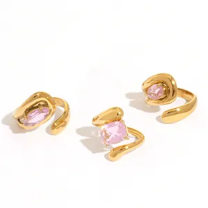 Adjustable gold plated rings with pink cubic zirconia in geometric droplet shapes