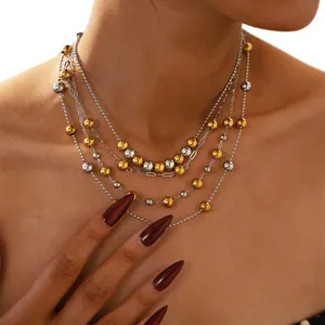 Multilayer gold and silver beaded necklace set with ball chain and paperclip link design