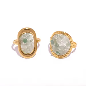 French style gold ring set with natural green stone and clear crystals in oval and round shapes