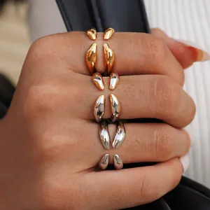 Anillos abiertos ajustables irregulares en oro y plata con diseño de gota