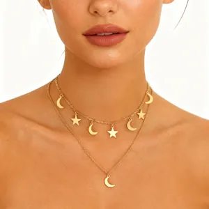 Double-layered gold necklace for women featuring layered star and moon charm pendants
