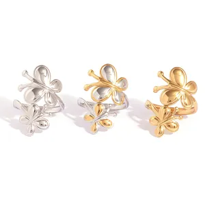 Trois bagues papillon élégantes en argent et or avec des anneaux réglables