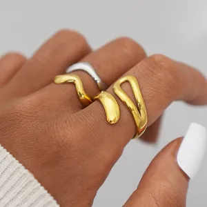 Minimalist gold and silver wavy stainless steel rings set for women worn on fingers