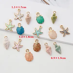 Enamel ocean charms set featuring starfish and seashells with gold plated edges for DIY jewelry