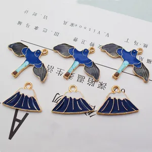 Emaille bedeltjes met blauwe vogels en de berg Fuji voor het maken van DIY-sieraden