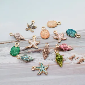 Ocean-themed gold alloy charms with starfish and conch shapes for DIY jewelry making