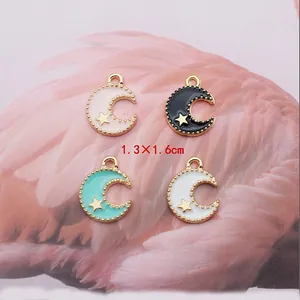 Star and moon alloy charms for DIY jewelry making in pink, black, green, and white colors