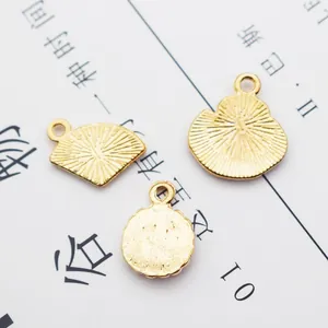 Set de tres colgantes japoneses de aleación chapada en oro para creación de joyas DIY