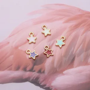 Star-shaped enamel charms in five colors with golden alloy finish for DIY jewelry