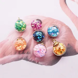 Set of 7 colorful crystal glass ball pendants with heart sequins for DIY jewelry making