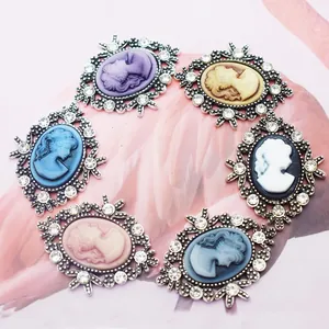 Set of six vintage silver alloy cameo charms with rhinestones in diverse colors