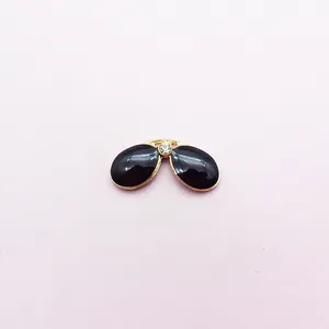 Kleiner schwarzer Emaille-Sonnenbrillen-Anhänger mit Goldsteg und Diamant-Inlay für DIY