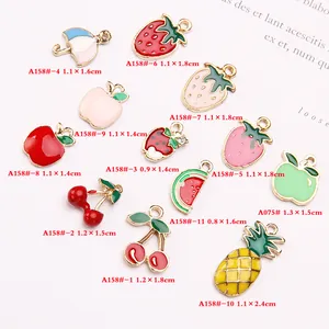 Colorful enamel fruit pendants including cherry and pineapple for DIY jewelry making