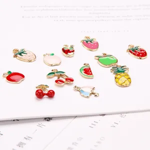 Colorful enamel fruit pendants including cherry and pineapple for DIY jewelry making