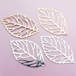 Golden and silver metal hollow leaf pendants for DIY handmade jewelry crafts