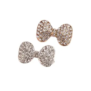 Bow-shaped DIY jewelry charm with inlaid crystals and pearls in gold and silver finish