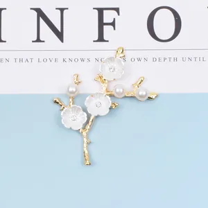 Elegant gold flower branch brooch with white pearls and sparkling crystal inlay