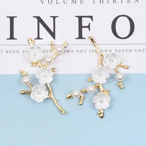 Elegant gold flower branch jewelry accessory with pearls and crystals for DIY crafts