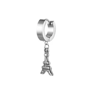 Detail of silver stainless steel huggie hoop earring with Eiffel Tower charm pendant