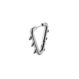 Close-up of a silver punk triangular earring with sharp cone rivets and polished finish