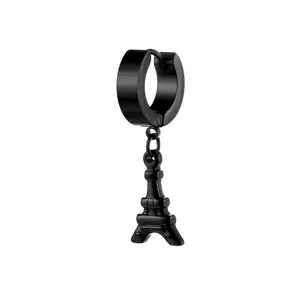 Macro shot of black titanium steel huggie earring with Eiffel Tower charm pendant