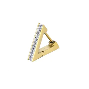 Close-up of golden triangle hoop earring with a row of inlaid sparkling cubic zirconia