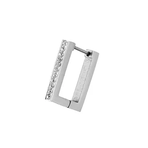 Polished titanium steel geometric earring with vertical row of crystal zircons on white base